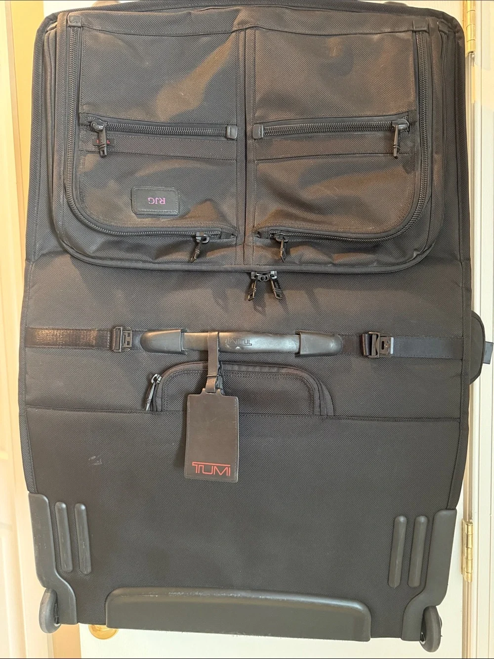 Tumi Black Fold-Open Garment Bag with Multiple Zip Pockets